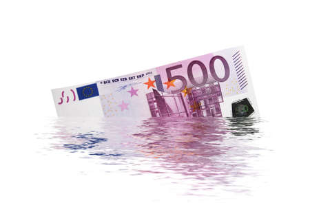 500 euro banknote sinking into the waterの写真素材