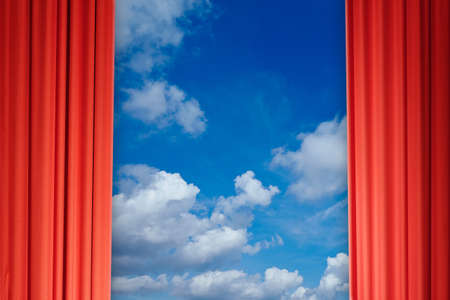 curtains with view of clouds and skyの写真素材