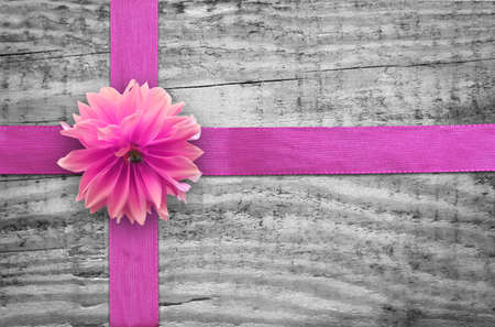 ribbon for gift wrap on wooden background の写真素材