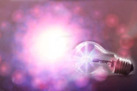 light bulb in bokeh backgroundの写真素材