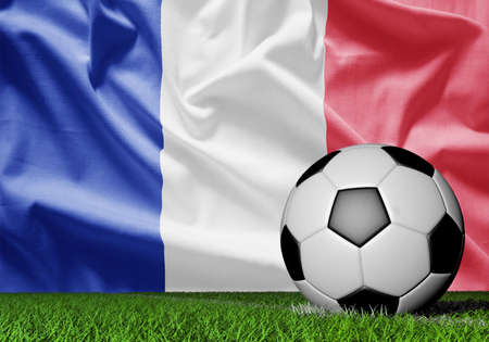 France flag and soccer ball on green grassの写真素材