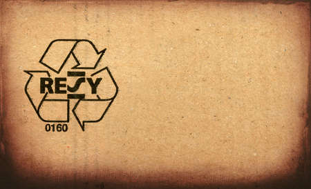 Recycle symbol printed on cardboardの写真素材