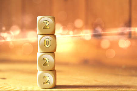 Happy new year 2021 concept with stack of wooden cubesの写真素材