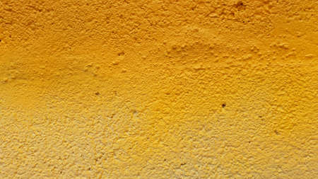Painted concrete wall in orange colorの写真素材