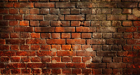 Photo of Old grunge brick wall backgroundの写真素材