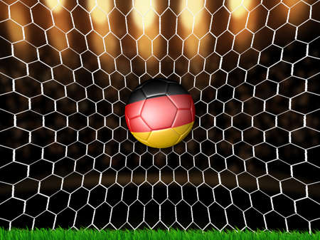 German flag soccer ball inside the net,Goalの写真素材