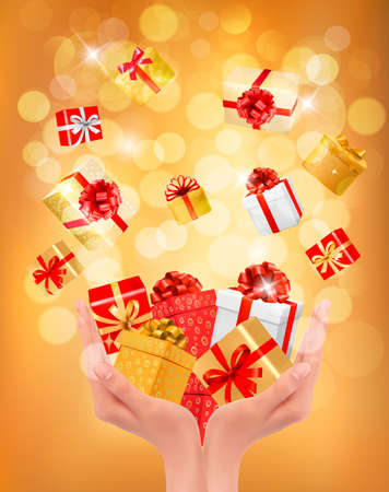 Holiday background with hands holding gift boxes. Concept of giving presentsのイラスト素材