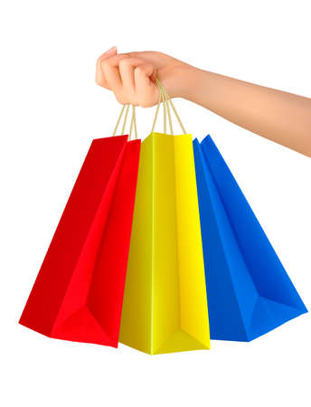 Female hand holding colorful shopping bags.のイラスト素材