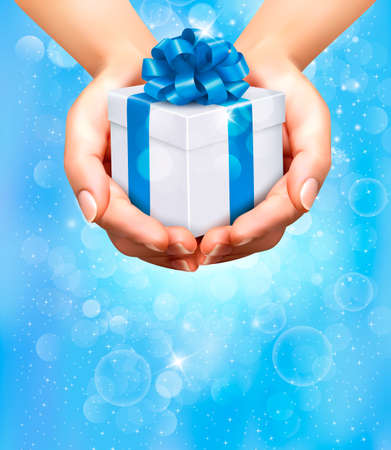Holiday background with hands holding gift boxes  Concept of giving presents のイラスト素材