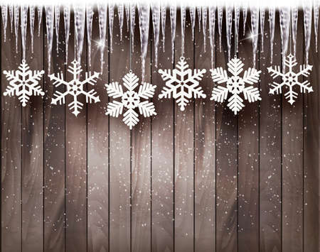Christmas background with snowflakes and icicles in front of a wooden wall.のイラスト素材