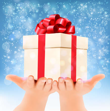 Holiday christmas background with hands holding gift box. Concept of giving presents. Vectorのイラスト素材