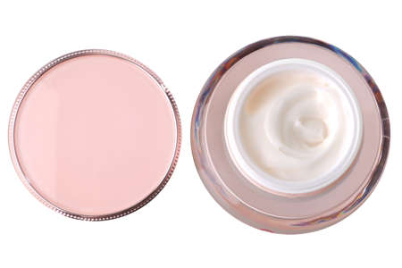 glass jar of beauty cream with cap, isolatedの写真素材