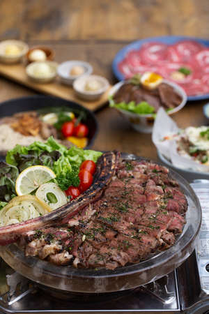 Grilled Beef steaks and vegetablesの写真素材