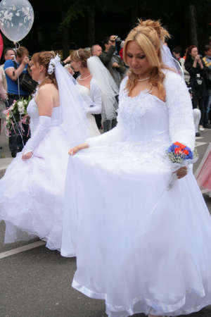 JURMALA - JUNE 13: 2nd annual wedding parade in resort city. Each year many brides from all country are participating in Bride parade - June 13, 2010 in Jurmala, Latvia.のeditorial素材