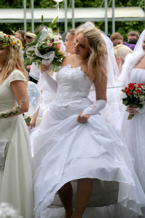 JURMALA - JUNE 13: 2nd annual wedding parade in resort city. Each year many brides from all country are participating in Bride parade - June 13, 2010 in Jurmala, Latvia.のeditorial素材