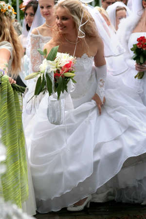 JURMALA - JUNE 13: 2nd annual wedding parade in resort city. Each year many brides from all country are participating in Bride parade - June 13, 2010 in Jurmala, Latvia.のeditorial素材