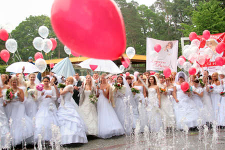 JURMALA - JUNE 13: 2nd annual wedding parade in resort city. Each year many brides from all country are participating in Bride parade - June 13, 2010 in Jurmala, Latvia.のeditorial素材