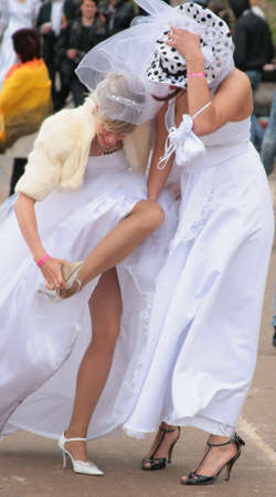 JURMALA - JUNE 13: 2nd annual wedding parade in resort city. Each year many brides from all country are participating in Bride parade - June 13, 2010 in Jurmala, Latvia.のeditorial素材