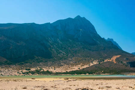 Beautiful Balos Lagoon with high mountains and Gramvousa island on Crete, Greece