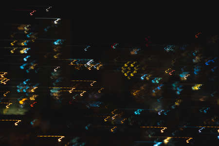 Lights trails in the black background. Color overlay light pattern.