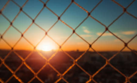 Sunset bokeh blur city background.の写真素材