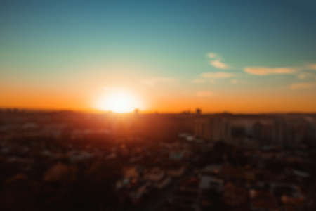 Sunset bokeh blur city background.の写真素材