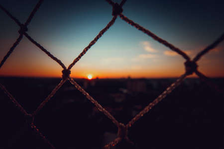 Sunset bokeh blur city background.の写真素材