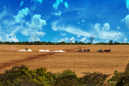 Tractors preparing the soil on the farm in Brazilの写真素材