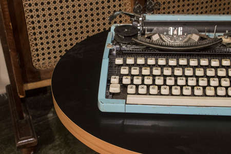 Old blue typewriter retro objects concept imageの写真素材