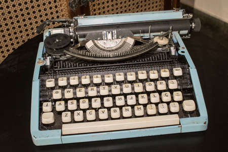 Old blue typewriter retro objects concept imageの写真素材