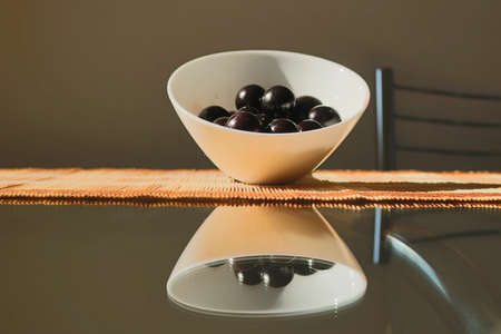 Fruit - Concept image of jabuticaba in the pot at the dinner table, selective focusの写真素材