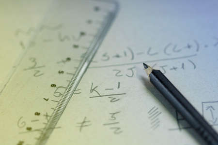 Business success concept Image. Handwriting formula on a paper with pen.の写真素材