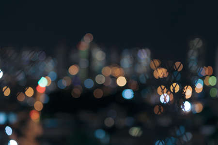 Bokeh colored lights city, abstract background, space for text.の写真素材
