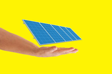 Green energy concept. Solar energy equipment on a hand. Closeup with space for text. Banner design.の写真素材