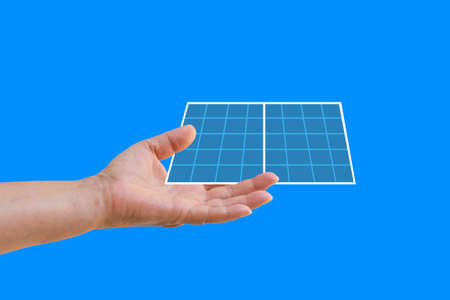 Green energy concept. Solar energy equipment on a hand. Closeup with space for text. Banner design.の写真素材