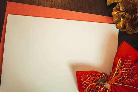 Christmas blank card with blurred background with Santa Claus, gifts and Christmas ornaments. Space for text.の写真素材