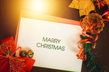 Christmas card with blurred background written Merry Christmas on white background.の写真素材