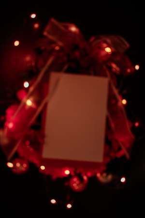 Christmas blurred background with gifts, ornaments and lights.の写真素材