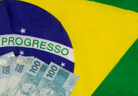 Brazilian Flag with Brazilian Money. Flag and Brazil Cash.の写真素材