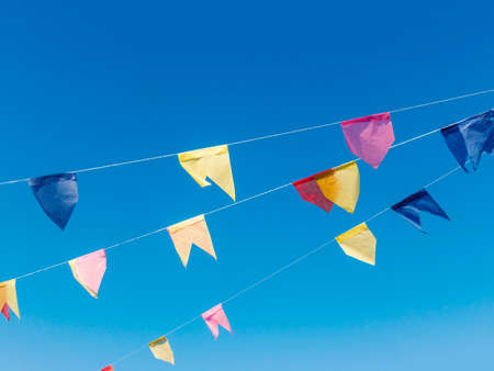Background of flags for junina party, famous party of Brazil that happens in the months of June and July. Brazilian Culture Concept Image.の写真素材