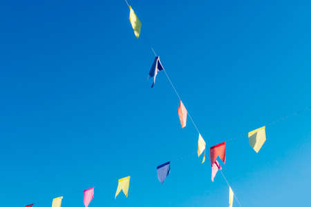 Background of flags for junina party, famous party of Brazil that happens in the months of June and July. Brazilian Culture Concept Image.の写真素材