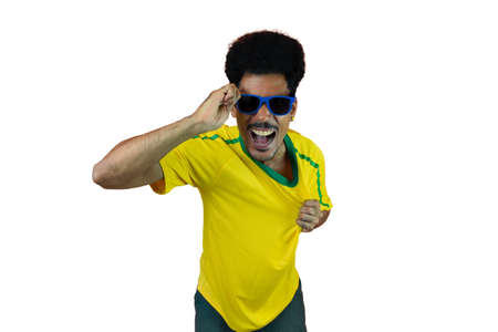 Soccer Brazilian  Fan Celebrating Isolated on White. Excited football fan cheering.