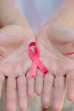Mature White Woman With pink ribbon isolated.の写真素材