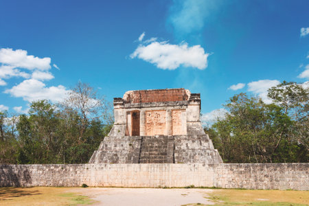 Pyramid and city in ruins in Tulum Mexico. Sunny Day in the Historic Maya City for tourism.の写真素材