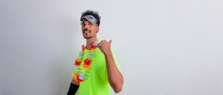 Carnival Brazilian Outfit. Black Man With Carnival Costume and Mask Pointing Isolated on White.