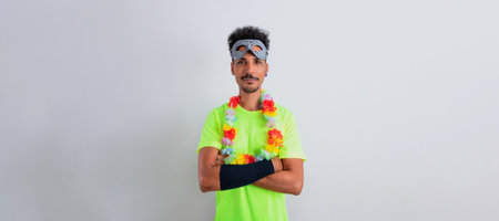 Carnival Brazilian Outfit. Black Man With Carnival Costume and Mask Smiling Isolated on White.