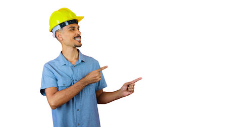 Black Man in Safety Helmet and Blue Shirt isolated on orange.