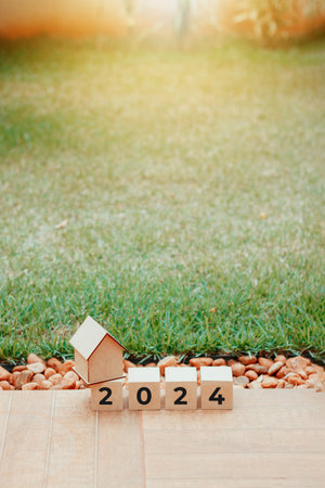 2024 New Year Blocs on Green Garden Sunny Day Background