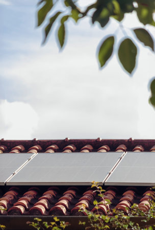 Photovoltaic Panels at Roof Solar in a Cinematic Day.の写真素材