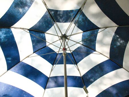 umbrella with stripesの写真素材